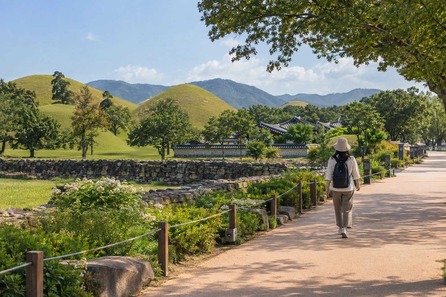 Conceptual daytime heritage path with tomb mounds, traditional roofs, greenery and a traveler.